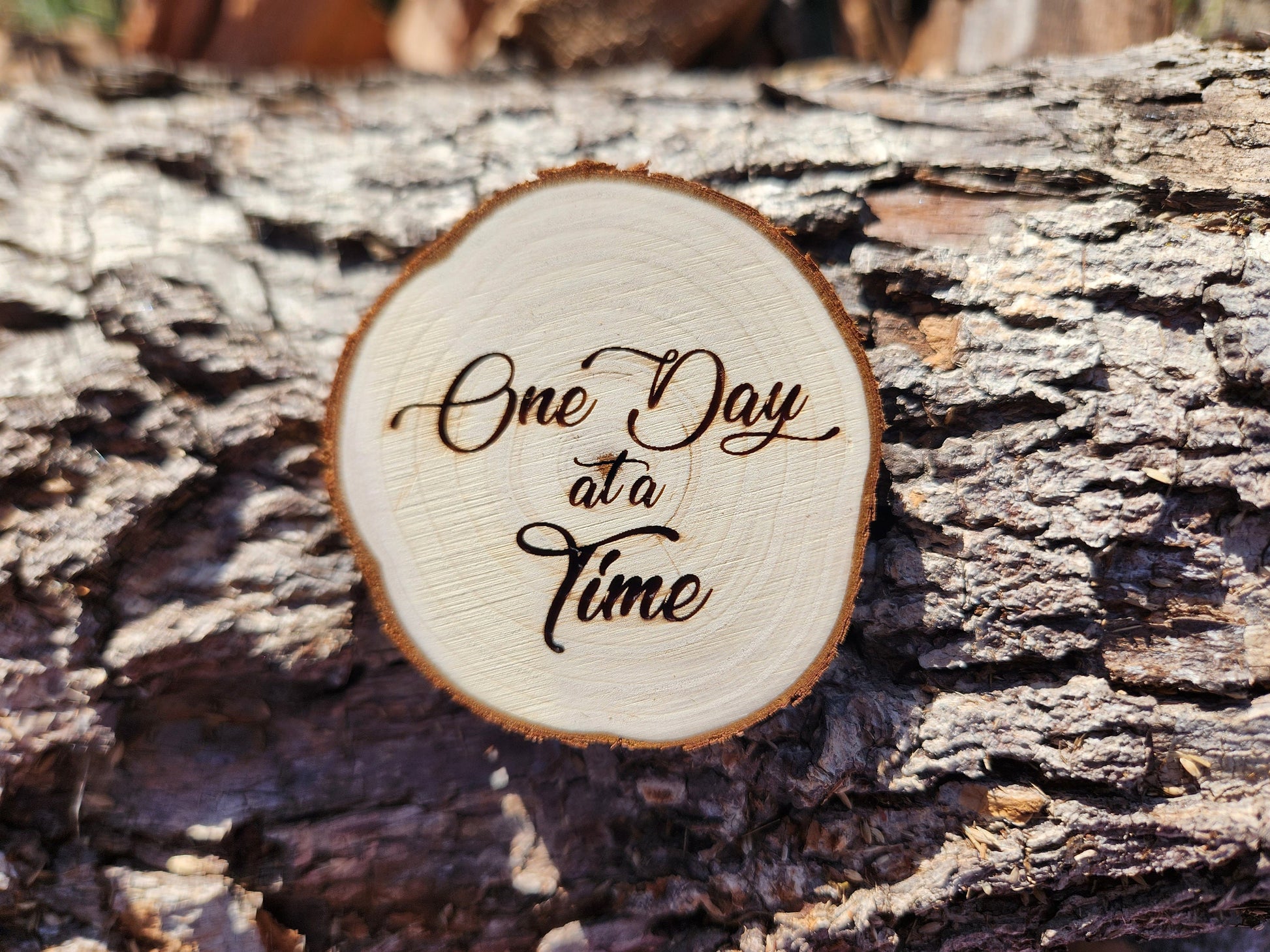 Tribal Roots Tree of Life natural wood sobriety token closeup