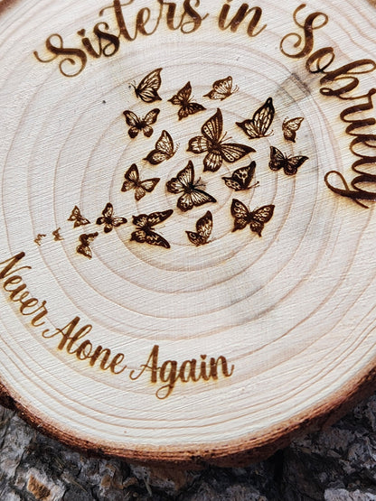 Newcomer Welcome Chip Caterpillar Butterflies wood medallion natural grain detail
