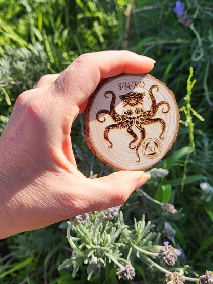 Octopus of Acceptance wood medallion natural grain detail