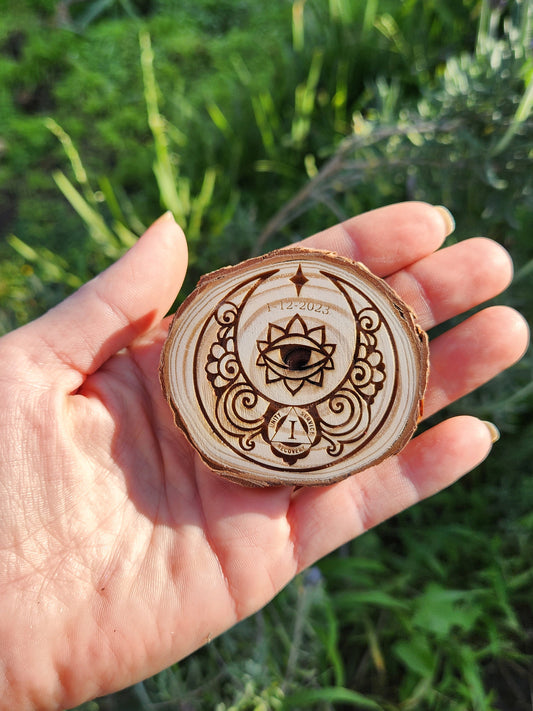 Eye on personalized AA sobriety medallion front view