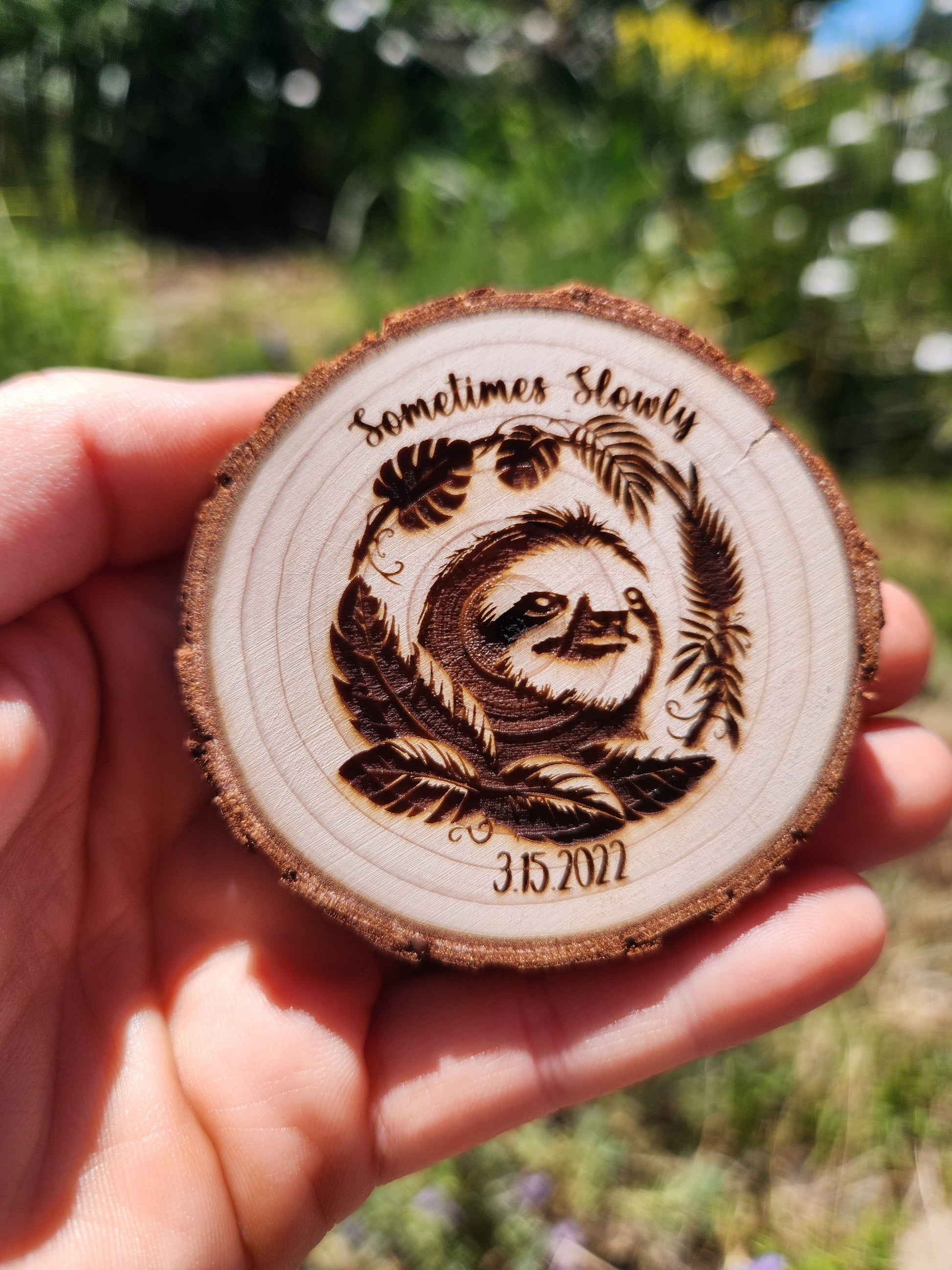 Sometimes Slowly Sloth wood medallion natural grain detail