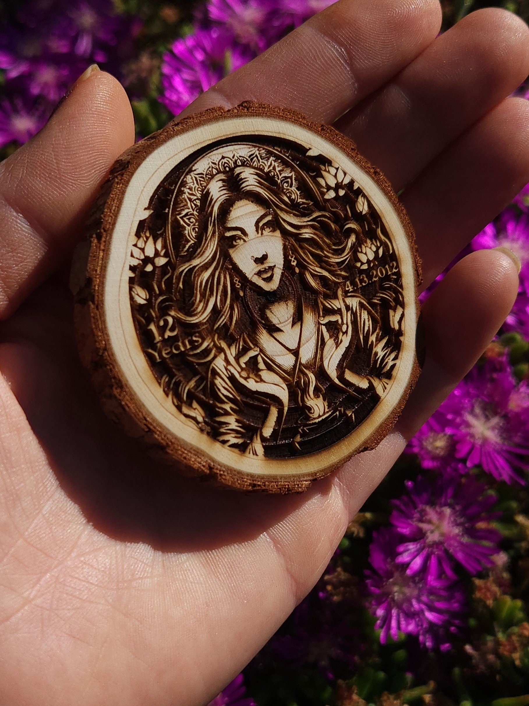 The Fire Goddess wood medallion natural grain detail